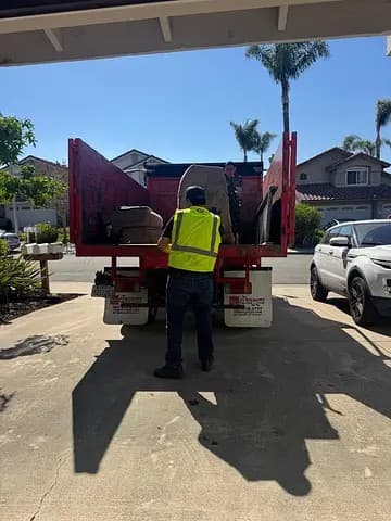 Crew loading a full-load pickup